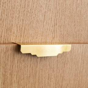 Poignée de tirage design Joséphine en laiton massif style Art Déco pour armoire et meuble, coloris Laiton brossé.